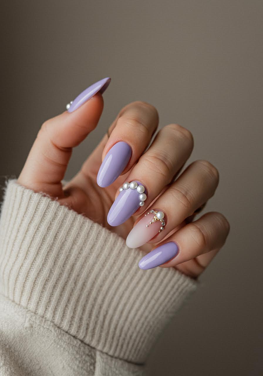 Soft lavender winter nails with pearl embellishments and delicate icy shimmer effects
