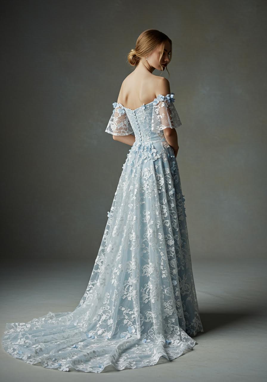 Ethereal light blue and white lace wedding gown with flowing layers and delicate embroidery